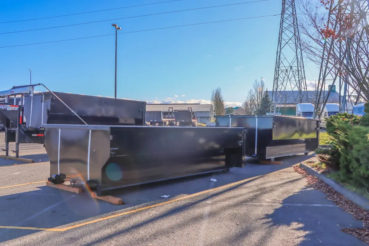 Roll-off dumpster ready for waste disposal at job site for 15 Yard Dumpster Rental in Bourne